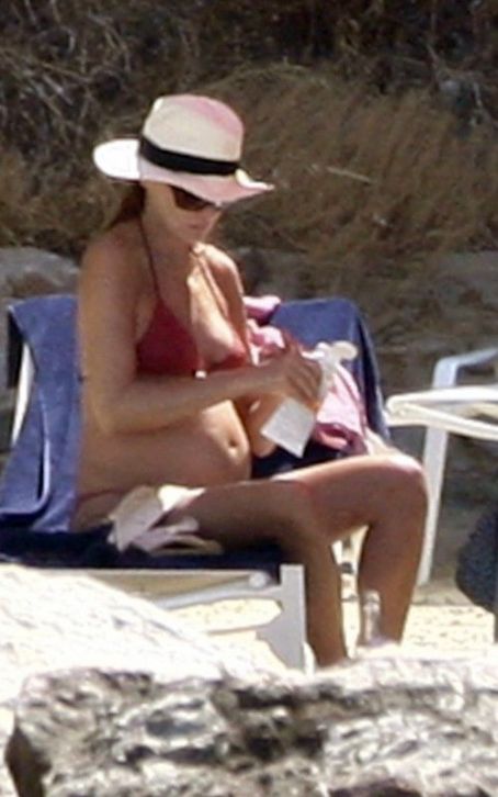 Carla Bruni Shows Off Baby Bump in a Skimpy Bikini