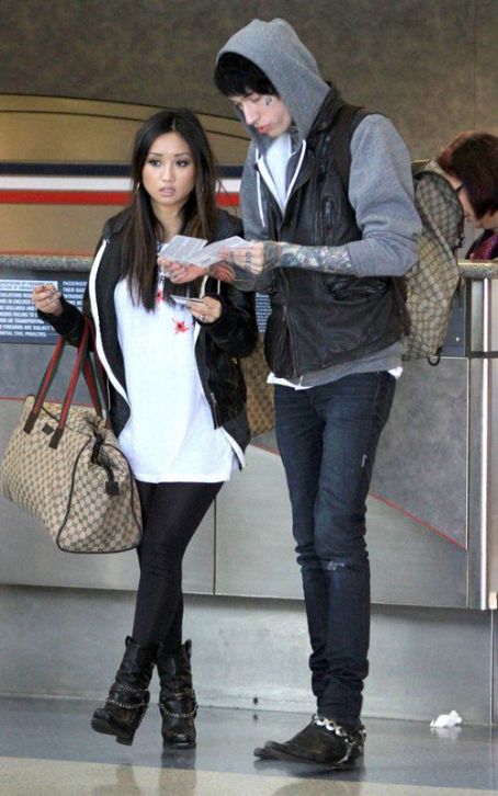 Trace Cyrus and Brenda Song were spotted at Los Angeles International