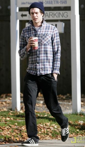 Adam Brody grabs a hot drink at Starbucks in between shooting his new movie