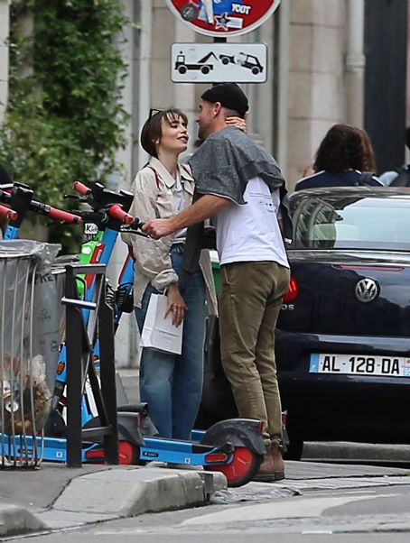 Lily Collins – With new boyfriend Charlie McDowell go for a ride in scooter in Paris