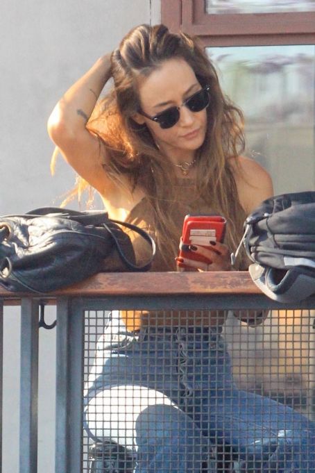 Maggie Q – Plays with her hair while at lunch in Hollywood