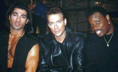 Jay Tavare, Jean Claude Van Damme and Grand L. Bush at a "Street Fighter" wrap party, 1994