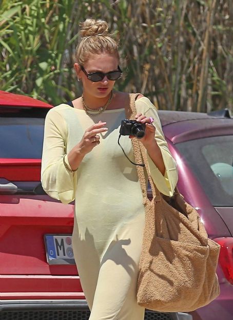 Romee Strijd – In a maxi yellow dress out for lunch at Casa Jondal in Ibiza