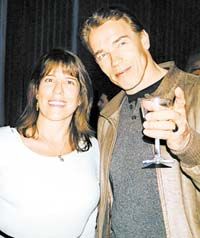 Arnold Schwarzenegger and Gigi Goyette