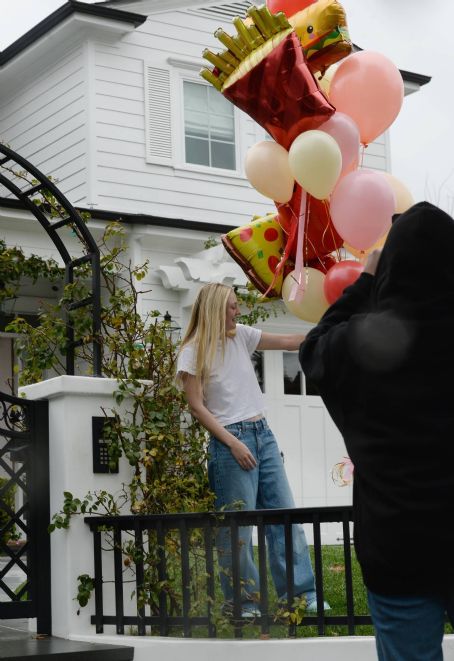 Dakota Fanning – Receives loads of balloons for her 29th birthday in