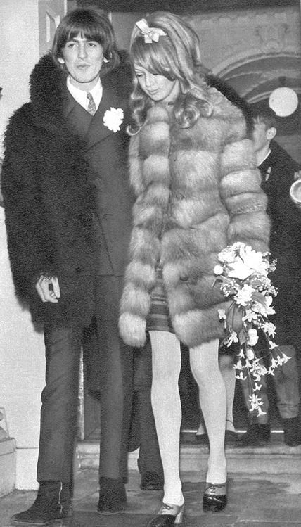 George wearing a fur-coat like his bride, leaves with Pattie Boyd, 21