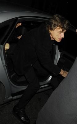 Mick Jagger and L'Wren Scott arriving back at Claridges Hotel, after attending his son James Jagger fancy dress birthday party, held at the Hedges and Butler club - London - 30 August 2006