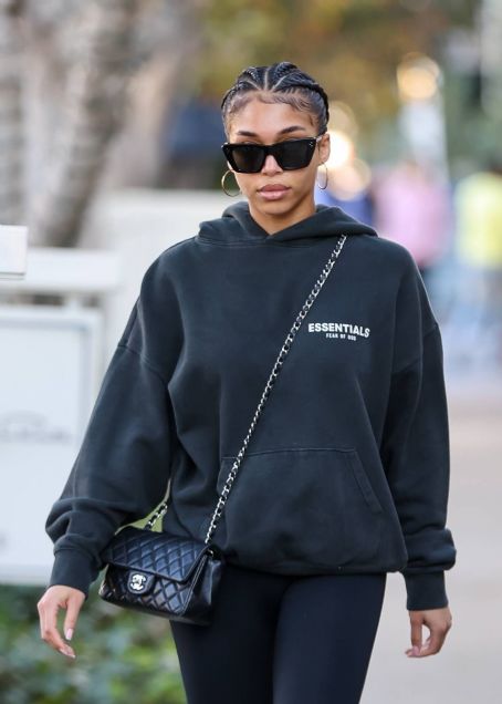 Lori Harvey – Wears thigh-high boots shopping on Melrose Place in West
