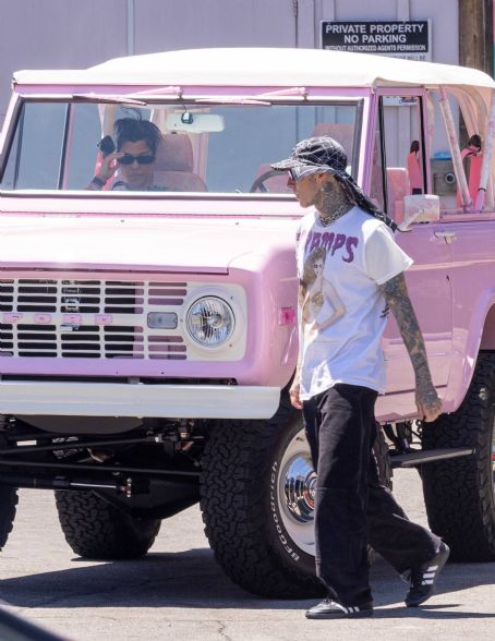 Kourtney Kardashian – With Travis Barker in their new Barbie-inspired SUV in Calabasas