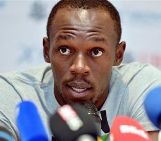 Usain Bolt Set to Soar Beyond Superman Michael Johnson in 400-Meter ...