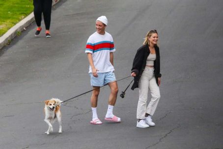 Olivia Holt – Walks her dog with a mystery friend in Los Angeles ...