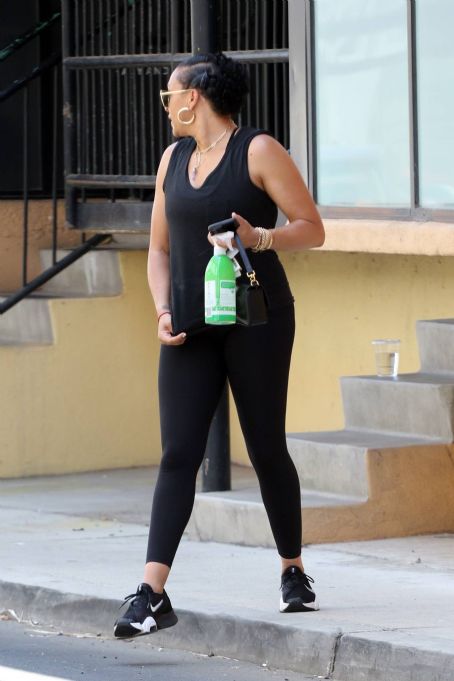 Tia Mowry Goes Dark in All-Black Leggings and Sneakers in Los Angeles