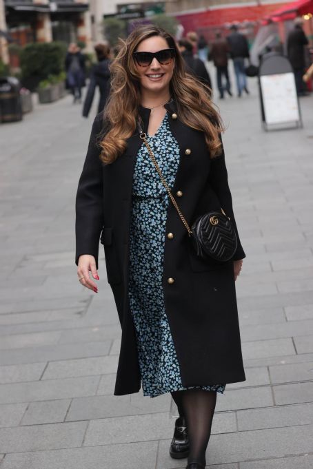 Kelly Brook – In a blue dress at Heart radio in London