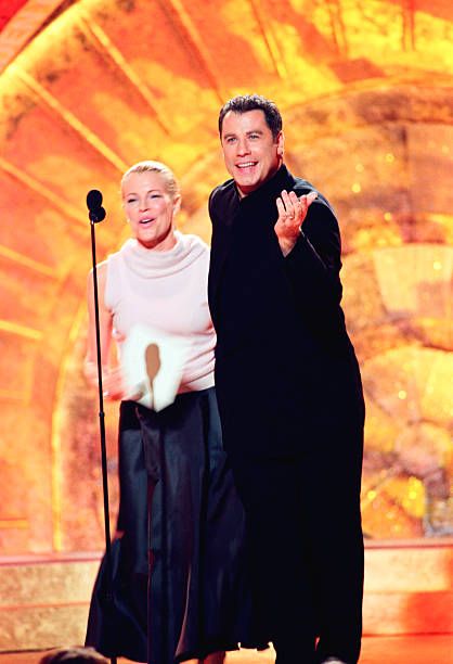 Kim Basinger and John Travolta - The 56th Annual Golden Globe Awards - Show(1999)