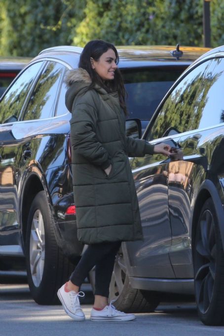 Mila Kunis – Out in olive green puffer jacket in Beverly Hills