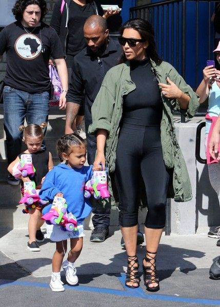 Kim Kardasian and clan go to a roller skating rink in Los Angeles to ...