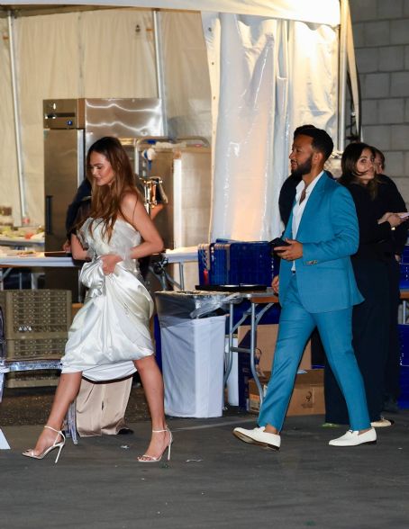 Chrissy Teigen – With John legend attend a charity event hosted by Prada at the Gagosian Gallery