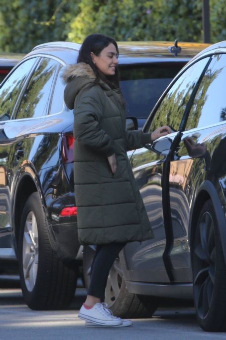 Mila Kunis – Out in olive green puffer jacket in Beverly Hills