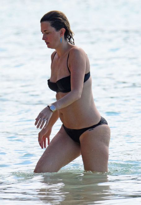 Rhea Durham in Black Bikini on the beach in Barbados