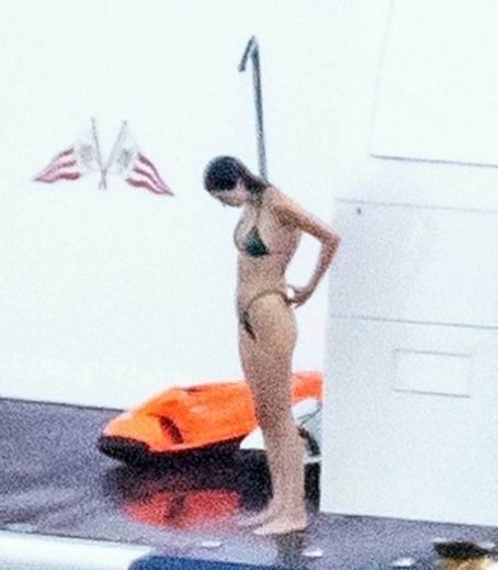 Kendall Jenner – pictured in a bikini while on a yacht in Salerno