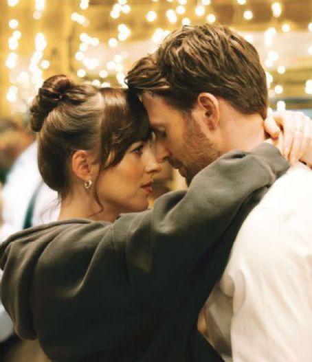 Dakota Johnson and Chris Evans