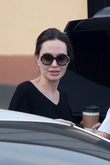 Angelina Jolie – In an all-black ensemble as she picks up food to go in Los Feliz