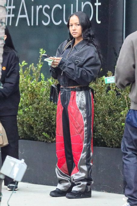 Karrueche Tran – In a baggy Nike track pants with her family at Jon and Vinny’s Pizza in LA
