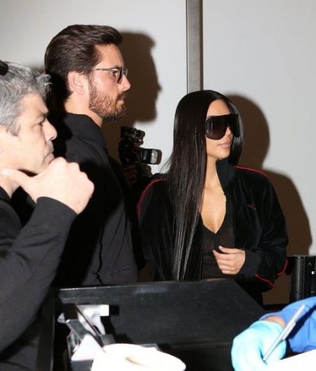 Scott Disick departing on a flight at LAX airport for Kim's