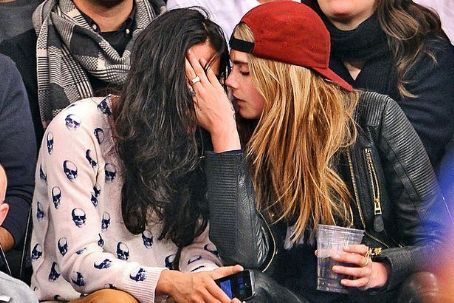 In pictures: Supermodel Cara Delevingne admits she's in love with US star Michelle Rodriguez after whirlwind romance