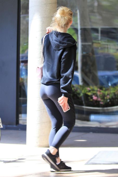 Elle Fanning hits Los Angeles gym in black leotard and leggings