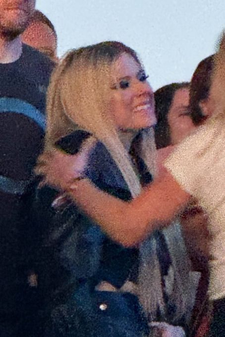 Avril Lavigne – Spotted with a new mystery man at the When We Were Young Festival in LA