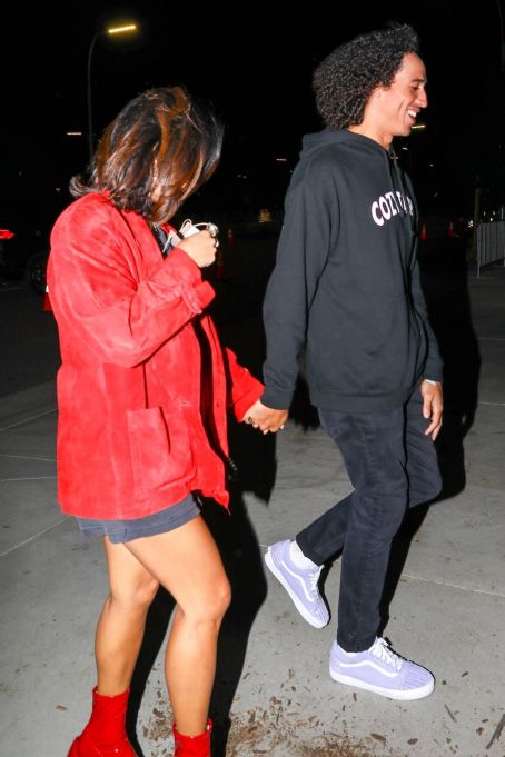Vanessa Hudgens and her boyfriend Cole Tucker held hands as they made their  way to The Rolling Stones concert in LA!…