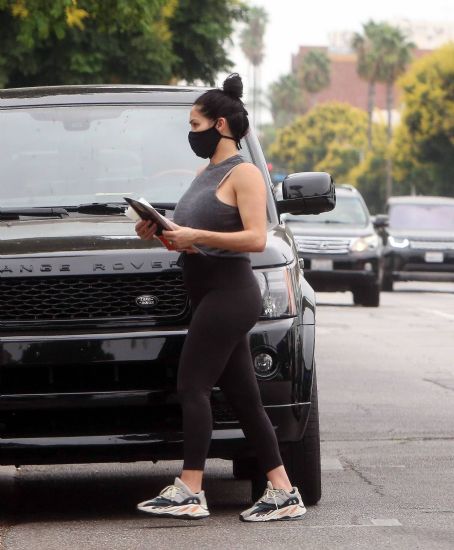 Nikki Bella shows off her fit body in BirdieBee tank, black leggings and  Yeezys while out