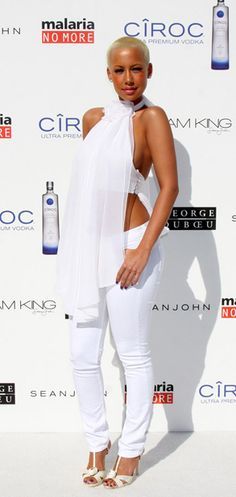 Amber Rose Attends the White Party hosted by Sean "Diddy" Combs and Ashton Kutcher to Help Raise Awareness for Malaria No More held at a Private Residence in Beverly Hills, California - July 4, 2009