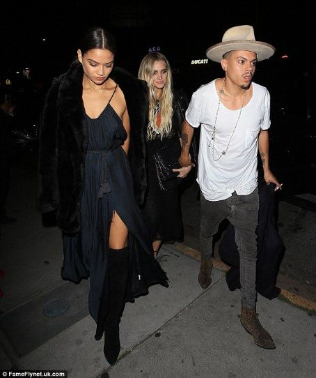 Third-wheeling! Shanina Shaik shows some skin in glam strappy dress as she heads to Gigi Hadid's star-studded birthday bash with pals Ashlee Simpson and Evan Ross