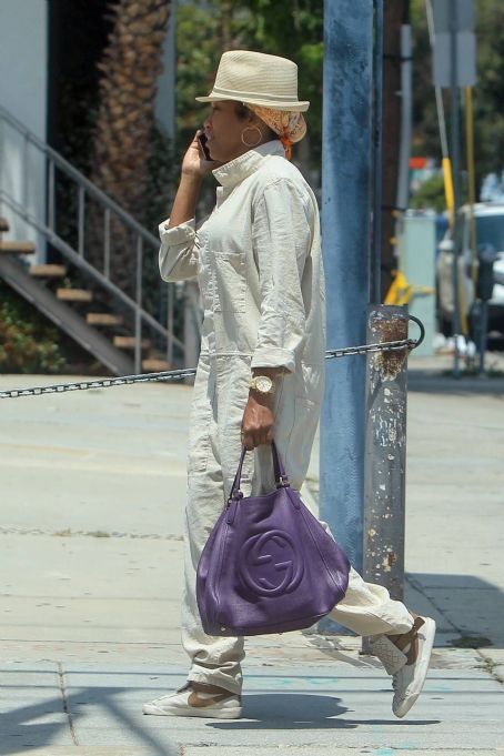 Regina King – Carrying a purple leather Gucci purse in West Hollywood