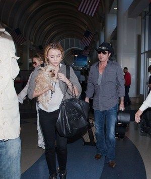 Miley Cyrus was spotted catching a departing flight out of the Los Angeles International Airport today, September 27