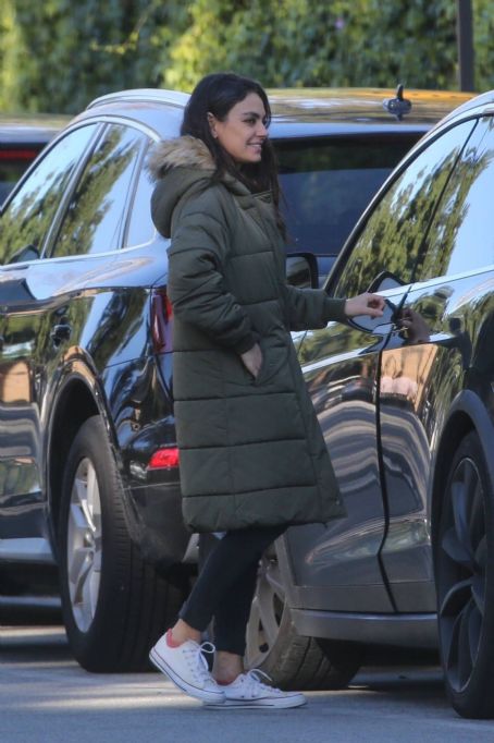 Mila Kunis – Out in olive green puffer jacket in Beverly Hills