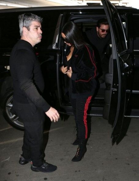 Scott Disick departing on a flight at LAX airport for Kim's