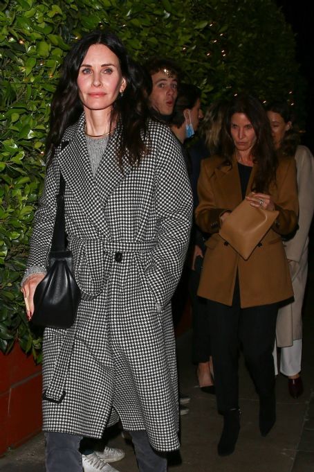 Courteney Cox – In a black and white long coat at Giorgio Baldi restaurant in Santa Monica