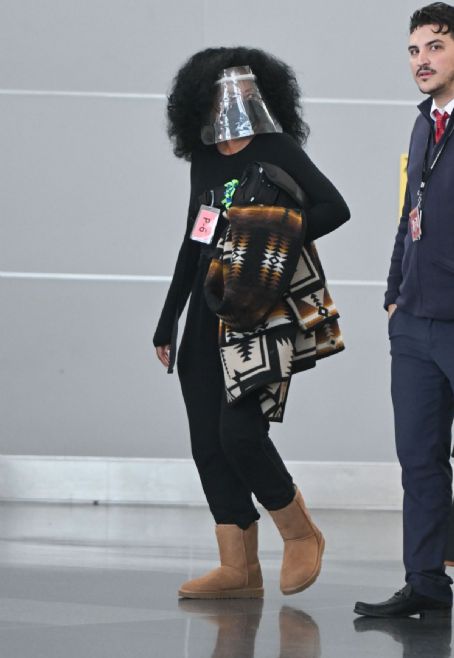 Diana Ross wears two protective masks  at JFK Airport in New York