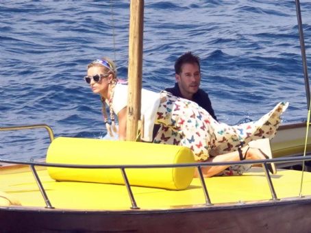 Paris Hilton – With her husband Carter Reum on a boat ride in Capri