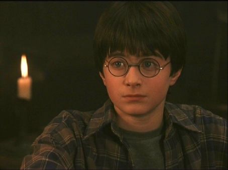 Daniel Radcliffe plays Harry Potter in Harry Potter and The Sorcerer's ...