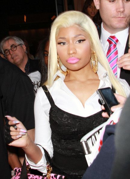 Nicki Minaj exits her hotel in New York City - FamousFix