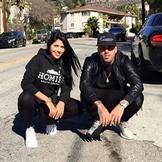 Nicky Jam and Angélica Cruz