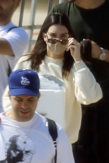 Kendall Jenner – In white seen arriving in Sardinia