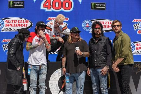 Motley Crue Attends The Monster Energy Nascar Cup Series Race At Auto Club Speedway At Auto Club Speedway On March 17 2019 In Fontana California Famousfix Com Post