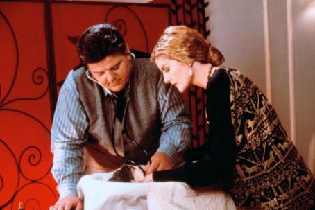Rene Russo and Robbie Coltrane