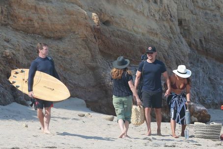 Luciana Barroso in a bikini with Matt Damon at the beach in Malibu