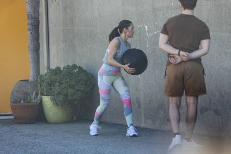 Minka Kelly – Doing ball slams while working out in Beverly Hills